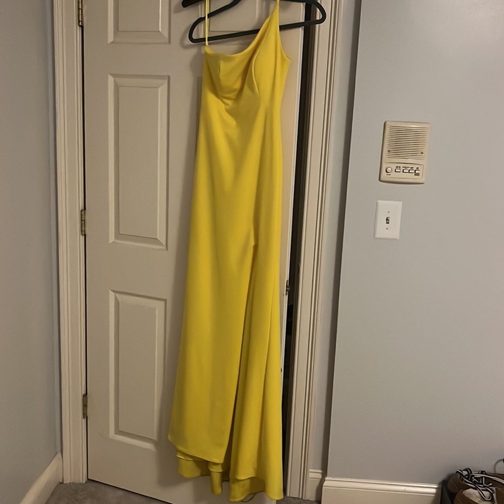 Bright yellow formal dress with slit